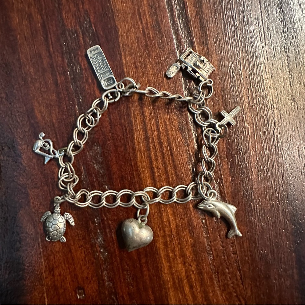 Vintage Charm Bracelet 7 Inches with 7 Sterling Silver Charms, Circa Early 1990s